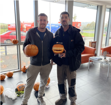 Abbey Machinery staff with carved halloween pumpkins