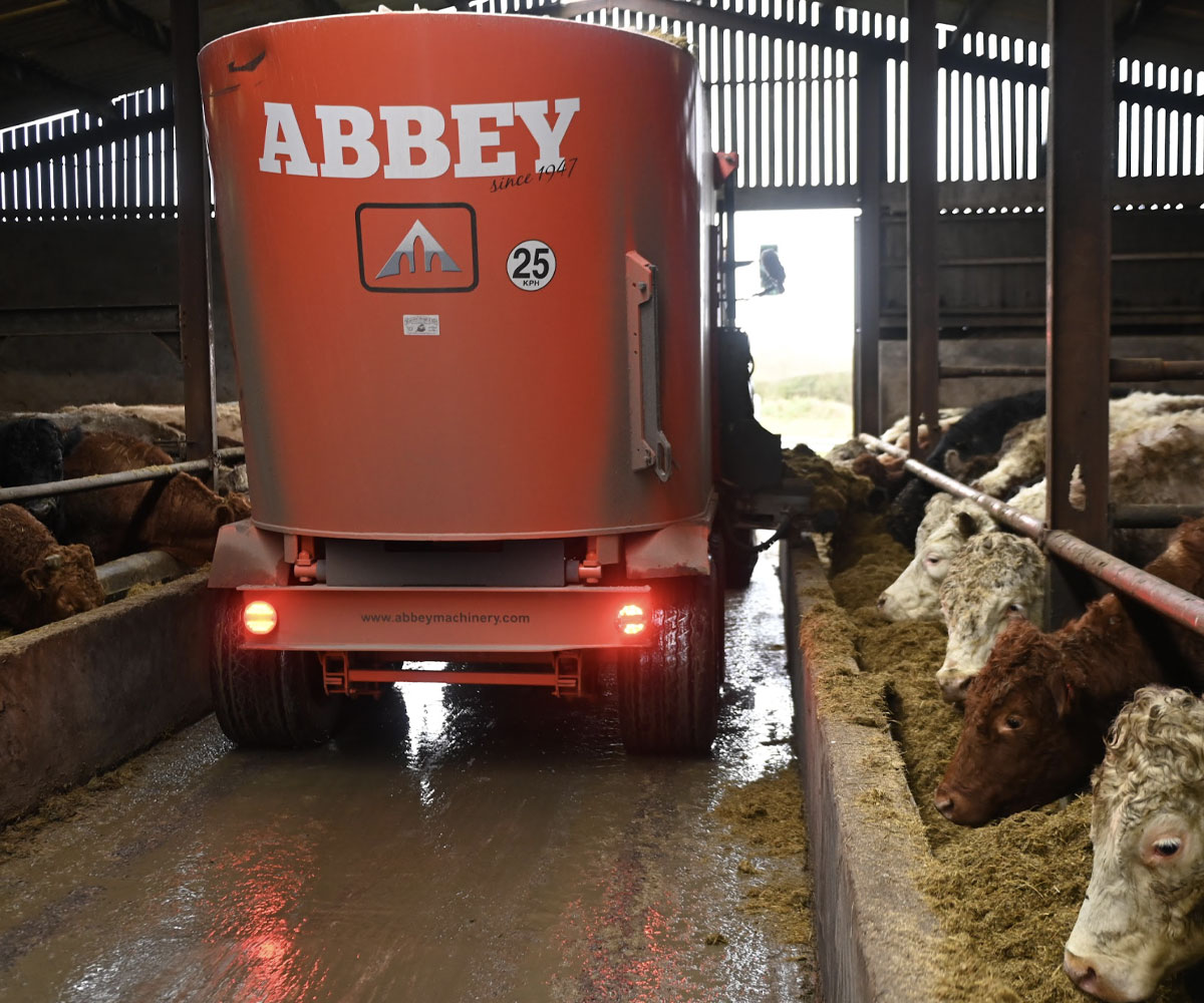 Abbey Machinery Single Auger Vertical Feeder in use feeding cattle