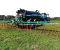 Abbey Machinery Band Spreader working in field